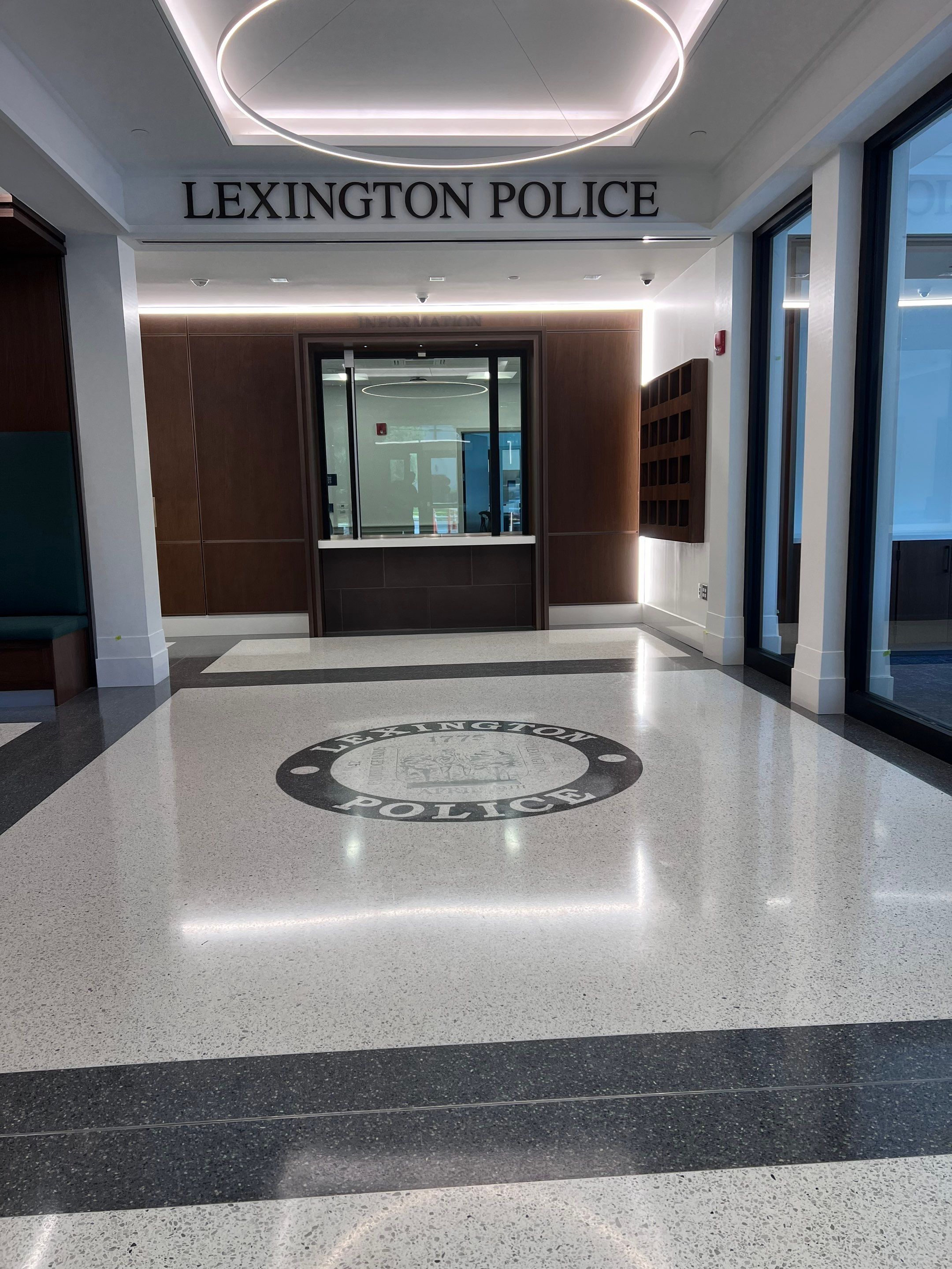 the inside of a building with lexington police department on the wall